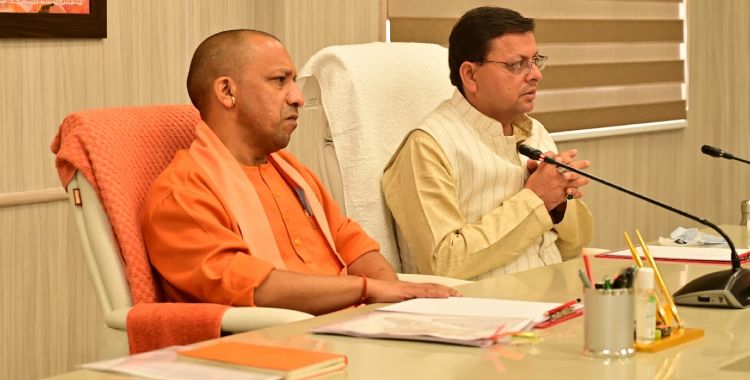 image: CM dhami and CM yogi resolved the asset dispute