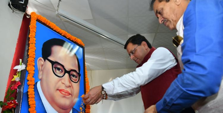 image: CM Dhami paid tribute to the portrait of Dr. Bhimrao Ambedkar on the occasion of Constitution Day
